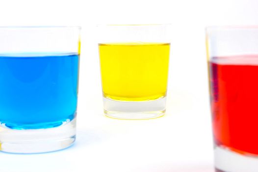 Glasses of soft drink isolated against a white background