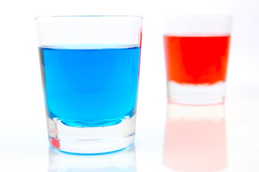 Glasses of soft drink isolated against a white background