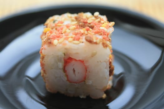 Sesame seed sushi, filled with raw crab