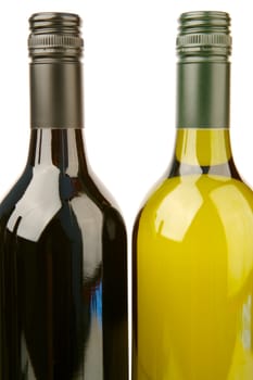 Bottles of red and white wine isolated against a white background