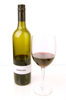 Red and white wine isolated against a white background