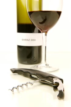 Red and white wine isolated against a white background