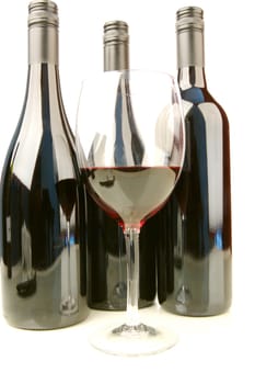 Red and white wine isolated against a white background