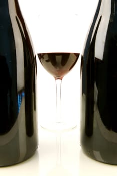 Red and white wine isolated against a white background