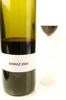 Red and white wine isolated against a white background