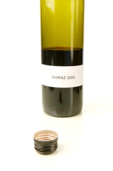 Red and white wine isolated against a white background