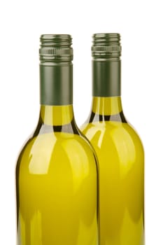 White wine bottles isolated against a white background