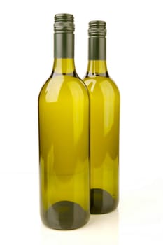 White wine bottles isolated against a white background