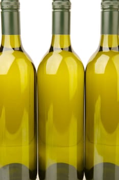 White wine bottles isolated against a white background