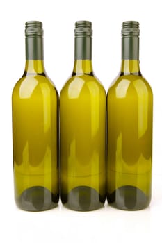 White wine bottles isolated against a white background