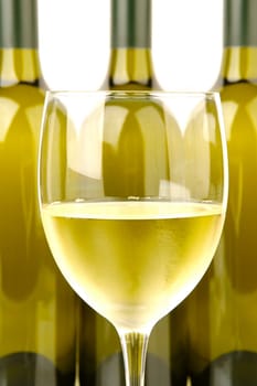 White wine bottles isolated against a white background