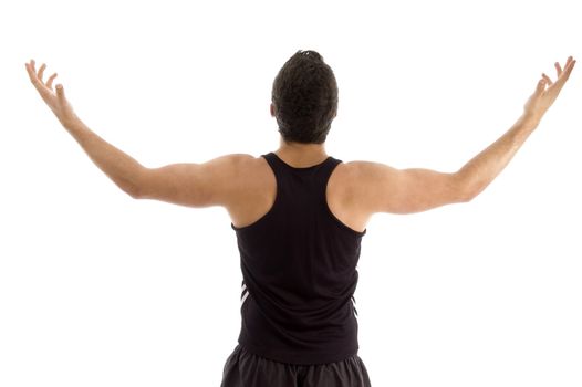 back pose of man with raised arms on an isolated background