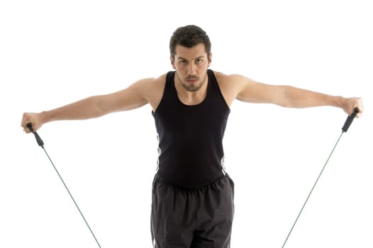 exercising man stretching rope on an isolated white background