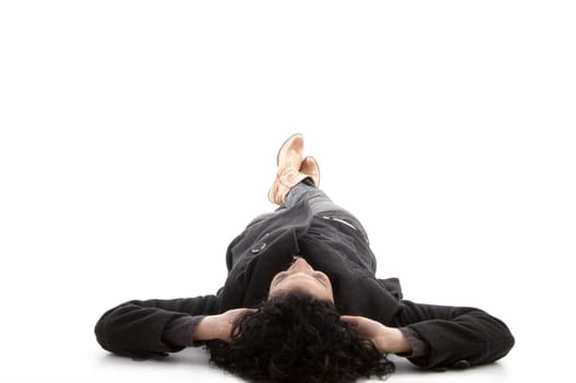 laying model looking upward against white background