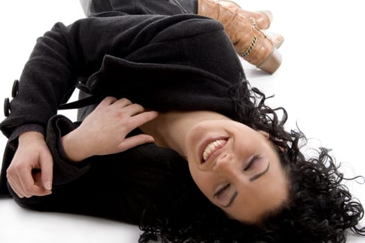 lying smiling beautiful model on an isolated background