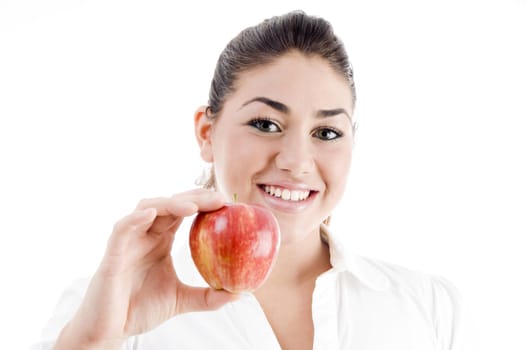 young attractive model holding an apple with white background