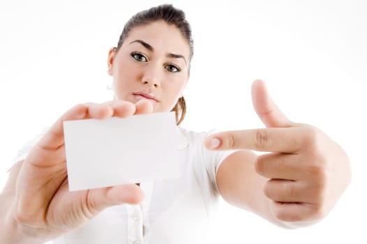 young attractive model pointing towards business card with white background