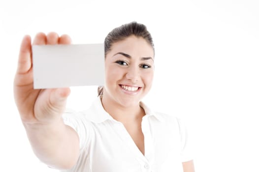 young attractive female showing business card with white background