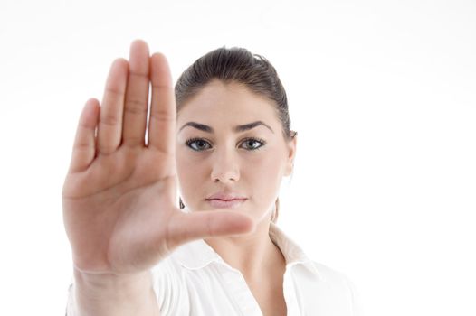 young attractive woman with stopping gesture against white background