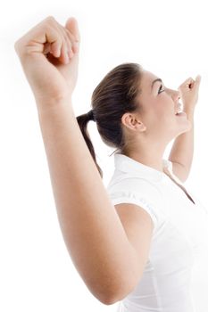 young attractive woman with outstretched arms against white background