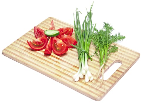 tomatoes and cucumbers on the cutting board