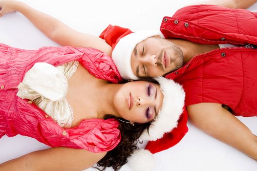 loving american couple lying down on floor on an isolated background