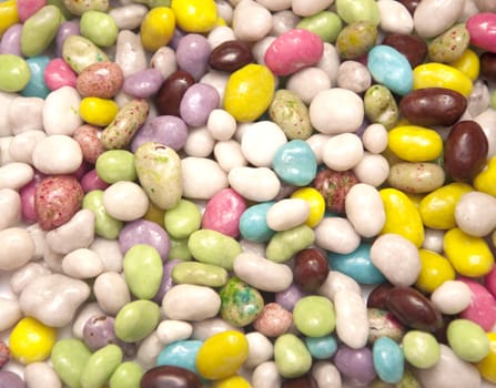 group of colored sweet candies isolated over white background 