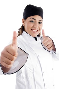 successful female chef showing thumbs up on an isolated white background