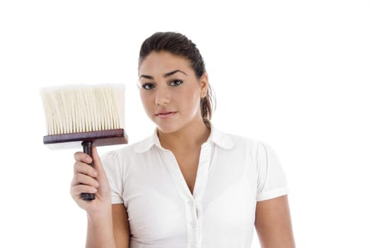 close up view of female cleaner holding dusting brush on an isolated background