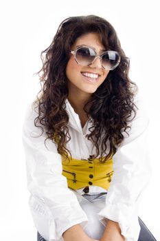 portrait of fashionable girl wearing sunglasses on an isolated background