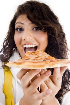 pretty woman eating delicious pizza against white background