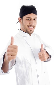 successful chef showing thumbs up on an isolated white background