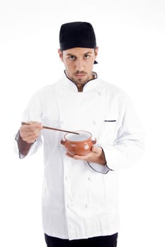 professional chef holding bowl and chopstick on an isolated background