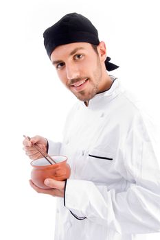 professional chef holding bowl and chopstick on an isolated background