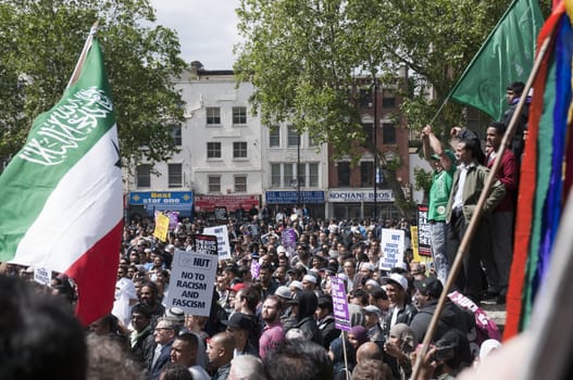 LONDON - JUNE 20: Thousands march in rally against the British National Party and the English Defence League in East London. June 20, 2010 in London, England.
