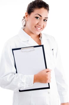 young female doctor holding writing pad on an isolated background