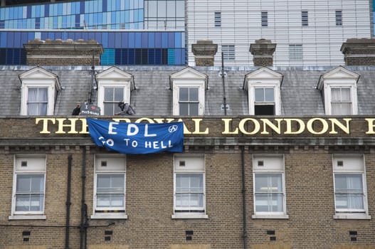 2010 in London, England., LONDON - JUNE 20: Protesters against the BNP and EDL on the roof of The Royal London Hospital. June 20