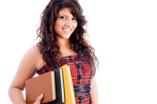 young student with books against white background