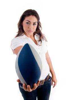 young woman showing rugby ball on an isolated white background