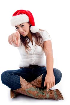 pointing woman with christmas hat against white background
