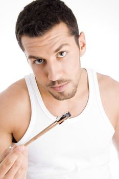 young man eating sushi food on an isolated background