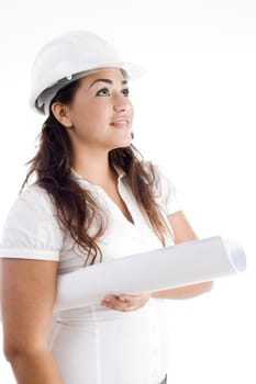 architect with helmet and hardhat and looking upward with white background