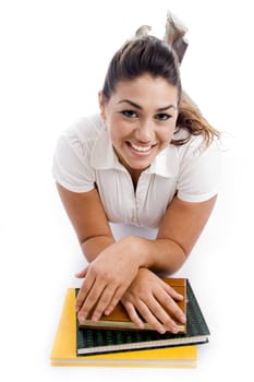 laying student with books on an isolated white background