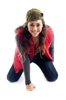 smiling sitting woman looking at camera against white background