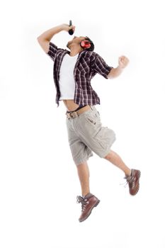 male model  jumping high in air on an isolated white background