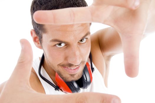 male showing framing hand gesture on an isolated white background