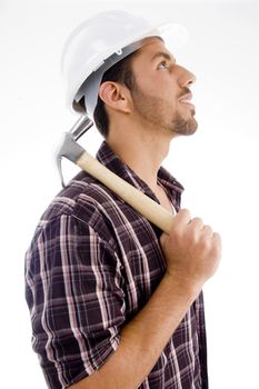 side pose of architect holding hammer on an isolated background