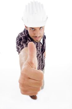 view of architect showing thumb up against white background