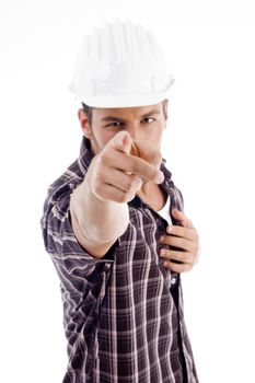 architect pointing at camera on an isolated white background