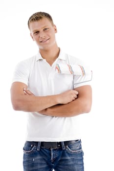 handsome model with folded arms against white background